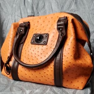 Orange and Brown Leather Satchel with Structured Design